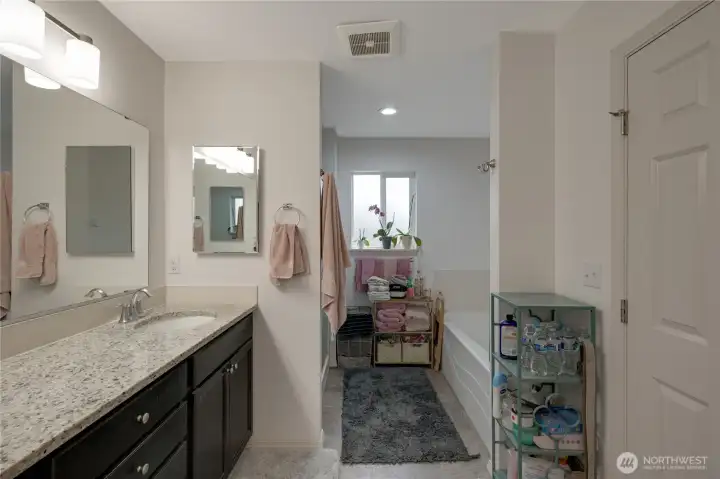 Your new primary bedroom includes a walk-in closet and a gleaming en-suite bath with double vanity and abundant counter and storage space. You'll love the luxury!