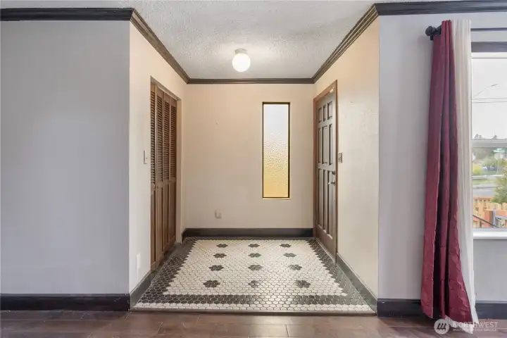 Entry with tile flooring