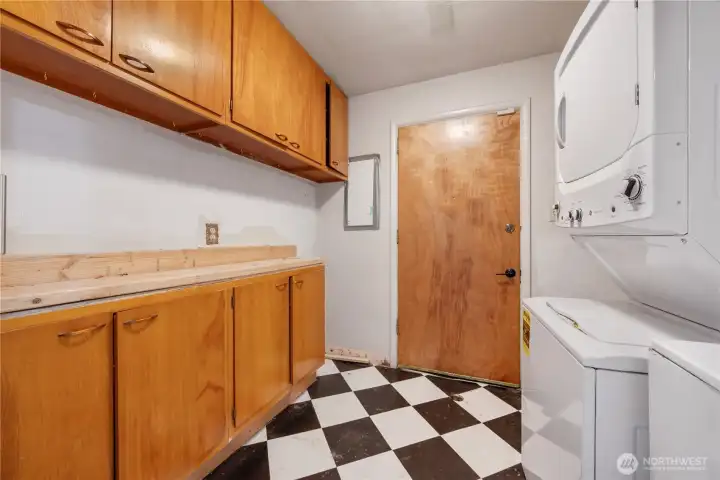 Utility Room with back yard access
