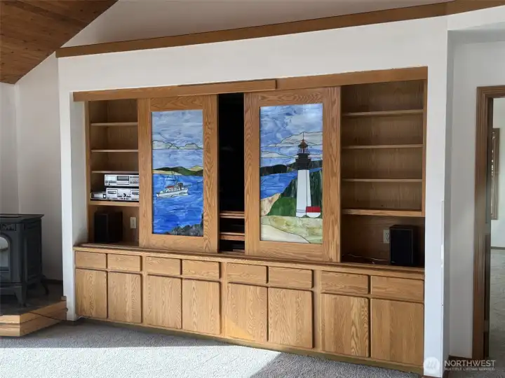 Custom TV / Stained Glass cabinet reverses to Primary Suite