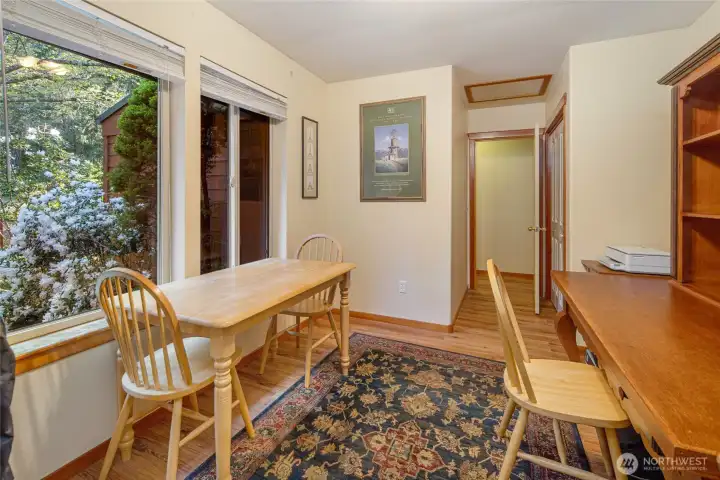 Flexible bonus room ideal for a home office, hobby space, or reading nook, complete with tranquil garden views.
