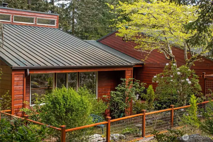 Attractive exterior with established landscaping and inviting entry creates wonderful curb appeal in this peaceful Friday Harbor neighborhood.