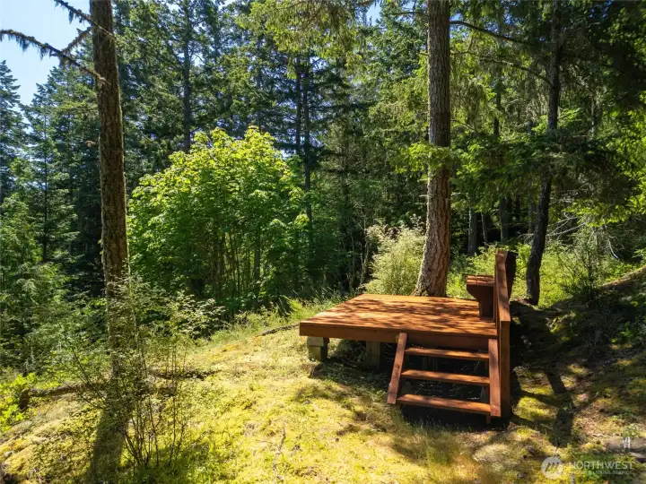 Viewing platform in a picturesque setting offers a peek of the distant mountain views.