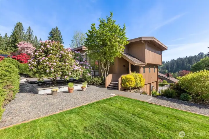 Beautifully landscaped front yard creates inviting curb appeal. Beautifully landscaped front yard creates inviting curb appeal.