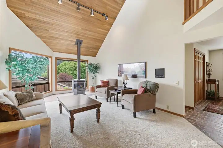 Look at the vaulted wood ceilings and the expansive windows Look at the vaulted wood ceilings and the expansive windows