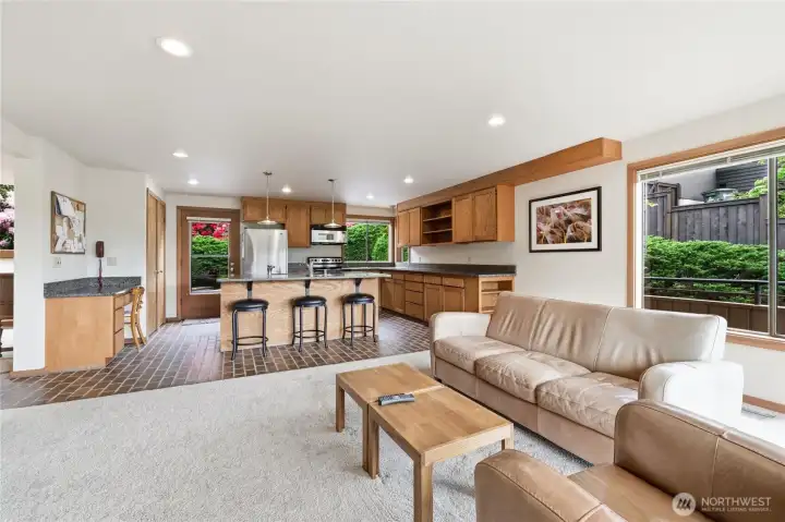 From the family room, enjoy the bright and open flow into the kitchen From the family room, enjoy the bright and open flow into the kitchen