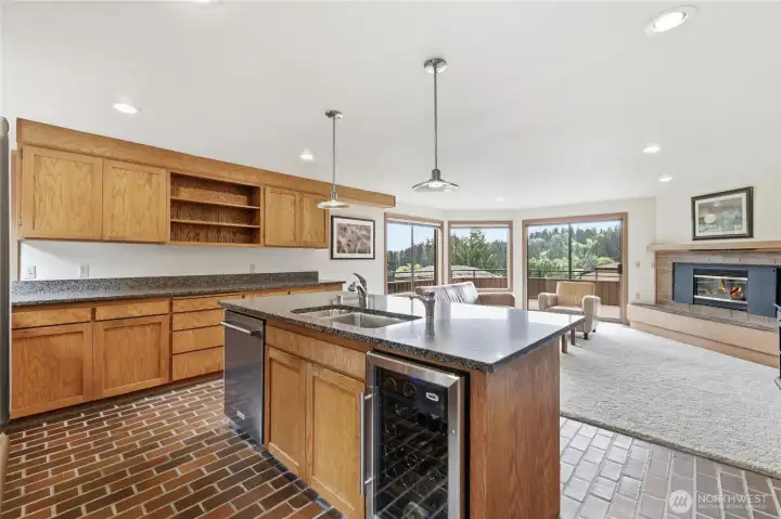 The island features a new dishwasher and wine fridge for added convenience and entertaining. The island features a new dishwasher and wine fridge for added convenience and entertaining.