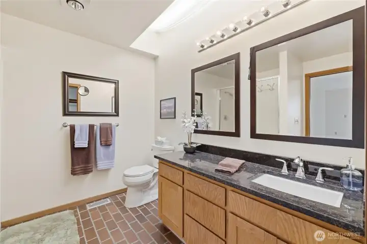 Primary bathroom featuring abundant counter space Primary bathroom featuring abundant counter space