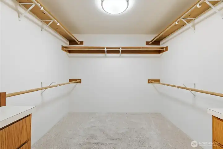 Oversized walk-in closet offering exceptional storage space. Oversized walk-in closet offering exceptional storage space.