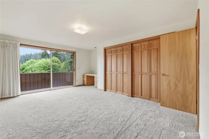 Looking into the spacious, light-filled bedroom with access to the private balcony. Looking into the spacious, light-filled bedroom with access to the private balcony.