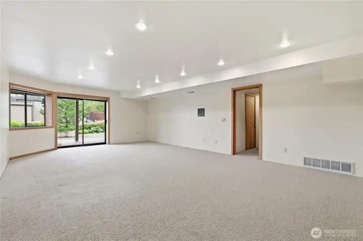 Different views of the spacious daylight basement showcasing its versatility and abundant natural light. Different views of the spacious daylight basement showcasing its versatility and abundant natural light.