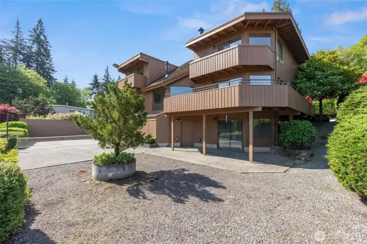The backyard offers the perfect spot to watch the action on the pickleball/sports court The backyard offers the perfect spot to watch the action on the pickleball/sports court