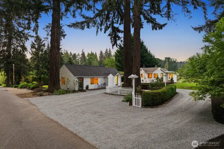 Arrive to relaxed Pacific Northwest Lake living on nearly an acre