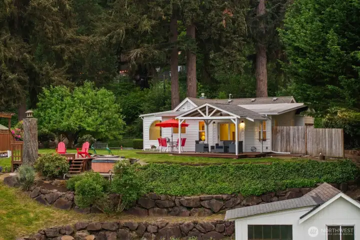 Relax, Lakeside rain or shine in the thoughtfully designed outdoor living spaces