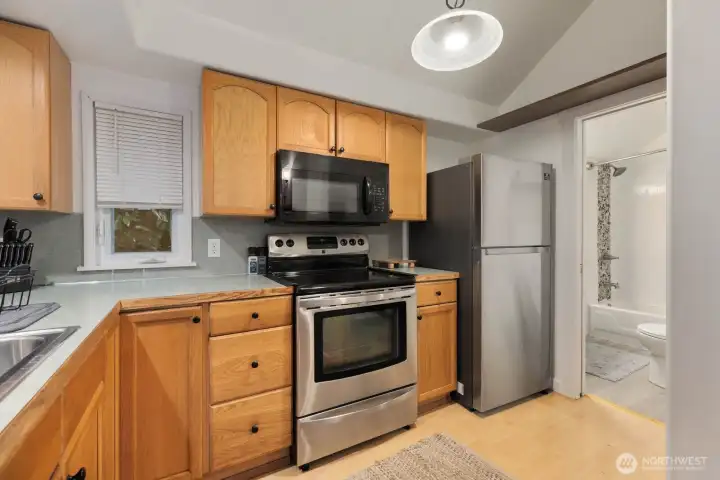 Fully equipped guest kitchen, ready for every day living or rental use.