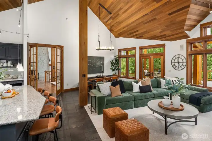 Living room + second dining space + open concept kitchen.