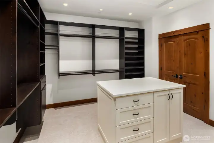 Primary walk-in closet.