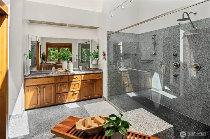 Primary bath with wall-to-wall shower & Japanese soaking tub.