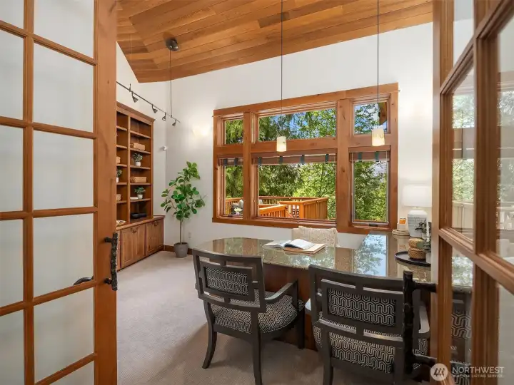 Office/den with built in cabintry & desk.