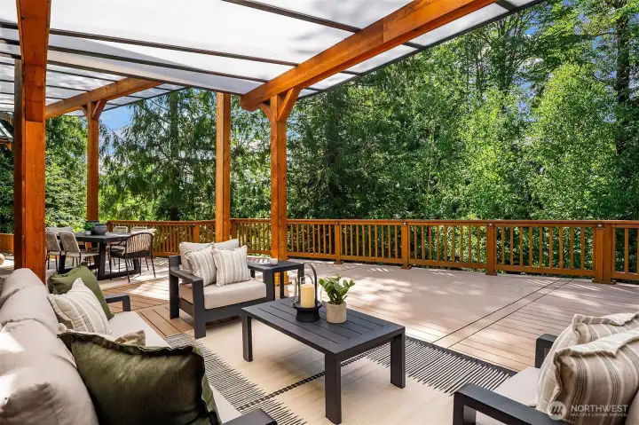 The entertaining patio runs the length of the home, with much of it covered for year round enjoyment.