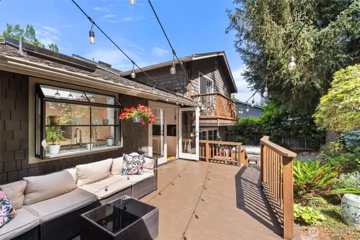 Enjoy outdoor living all summer long on this extended deck leading to the stunning backyard Enjoy outdoor living all summer long on this extended deck leading to the stunning backyard