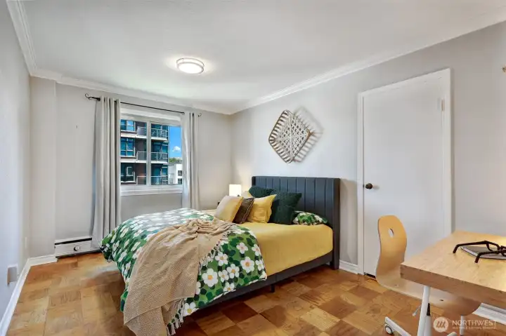 2nd bedroom with hardwood flooring.