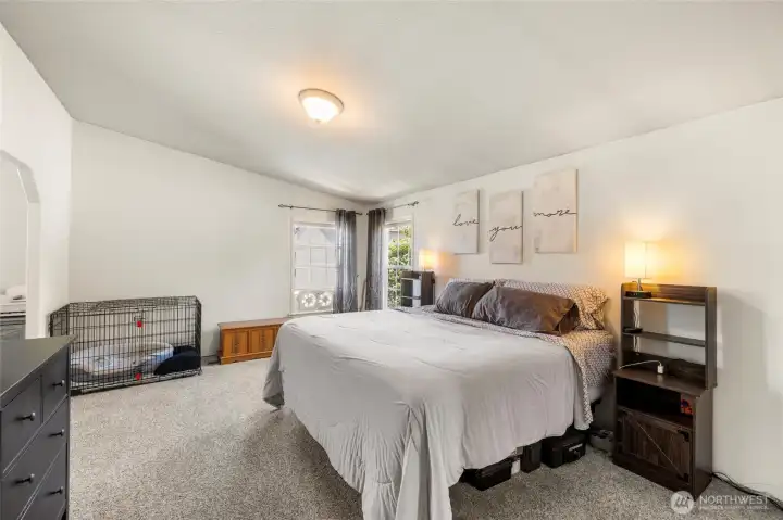 Large Primary Bedroom, with tons of storage and walk in closet Large Primary Bedroom, with tons of storage and walk in closet