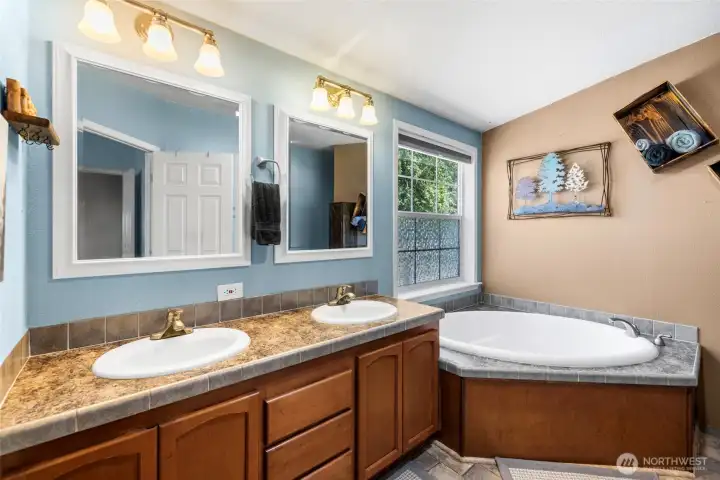 Large Primary Bathroom with the walk in closet. Large Primary Bathroom with the walk in closet.