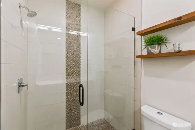Primary bath with large walk in shower.