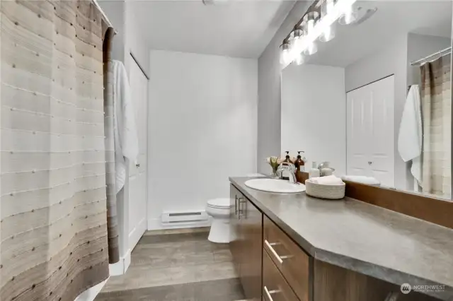 Well maintained main bath with ample storage.