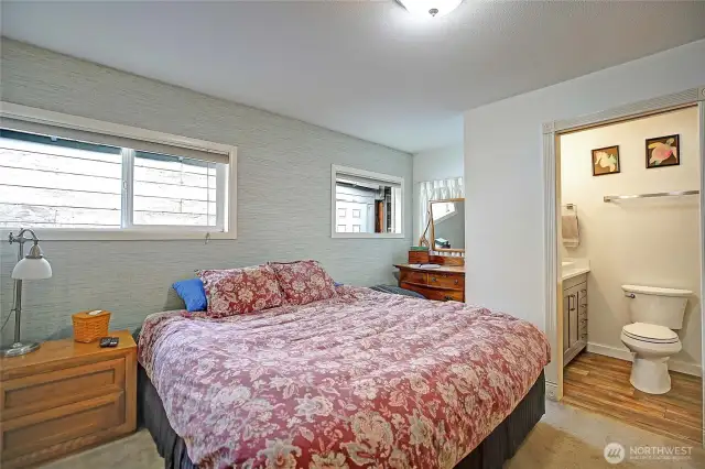 Primary bedroom with an en suite bathroom.
