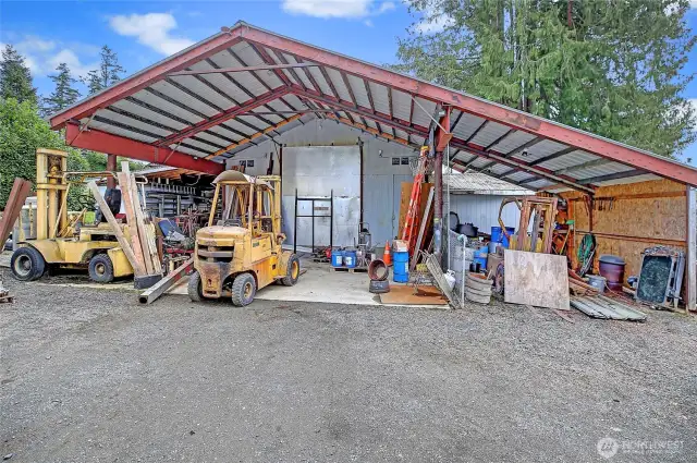 Lots of storage and parking space for cars, trailers, boats, etc. 12Wx14H rolling door.