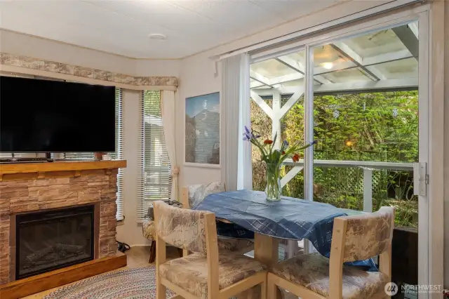 A roomy dining area, or move the table to the "office" to make full use of the slider.
