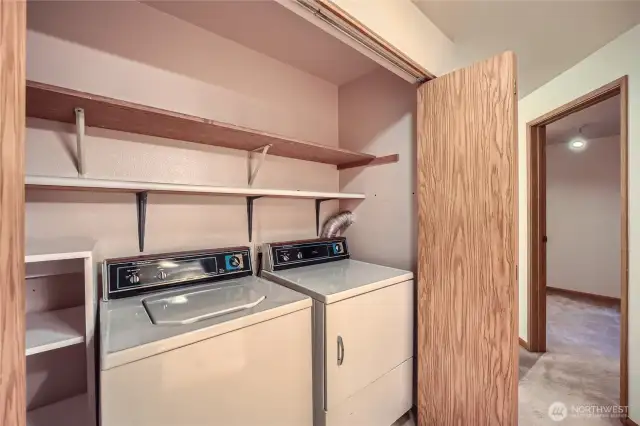 Hall Laundry Room. All Appliances stay! Hot water tank in this closet too