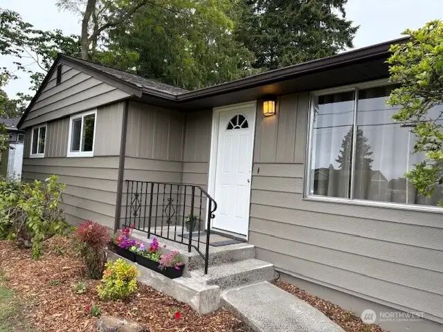 Recently painted aluminum siding outside, fresh paint and updates inside.
