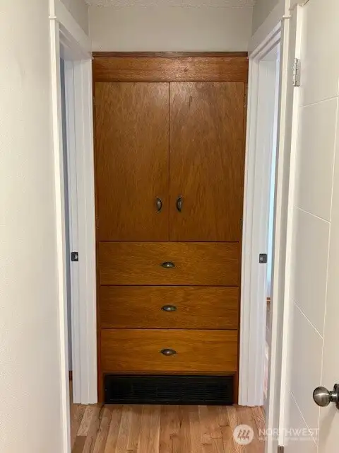 Built in linen closet in the hall upstairs