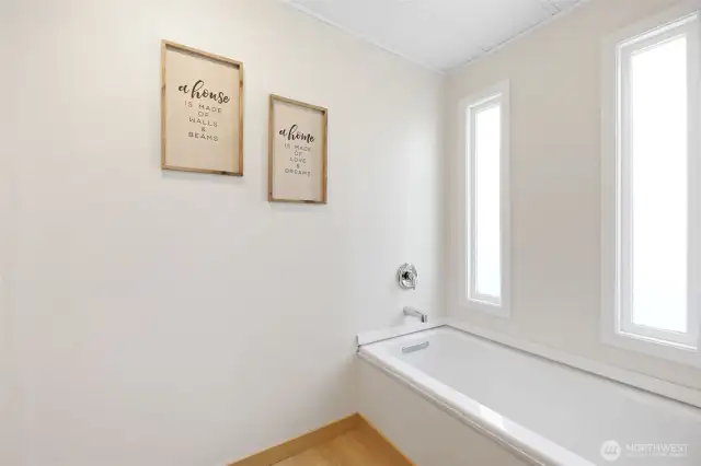 New Deep tub in primary en-suite.