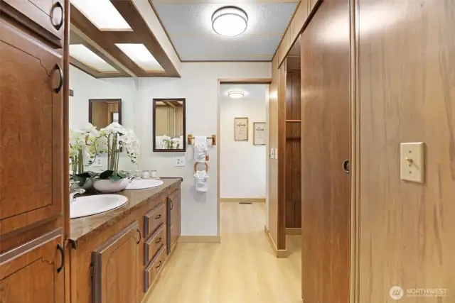 Double vanity with walk in closet.