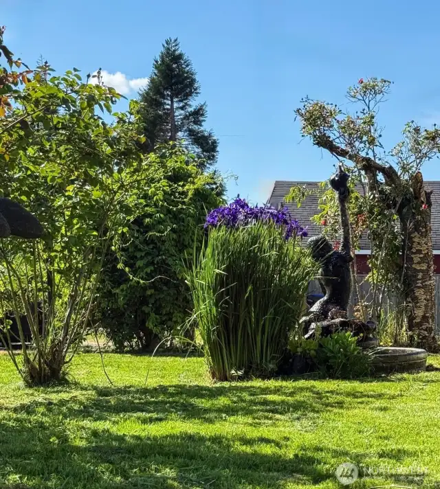 Peaceful fountain that birds love drinking from.