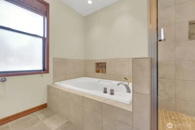 Deep jetted tub for relaxing at the end of a long day.