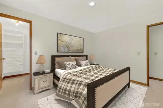 #2 bedroom with walk-in closet and built-in closet system.
