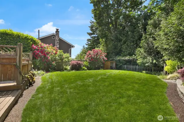 Beautifully landscaped, fenced back yard backs to a greenbelt.  Full yard irrigation including pot watering.