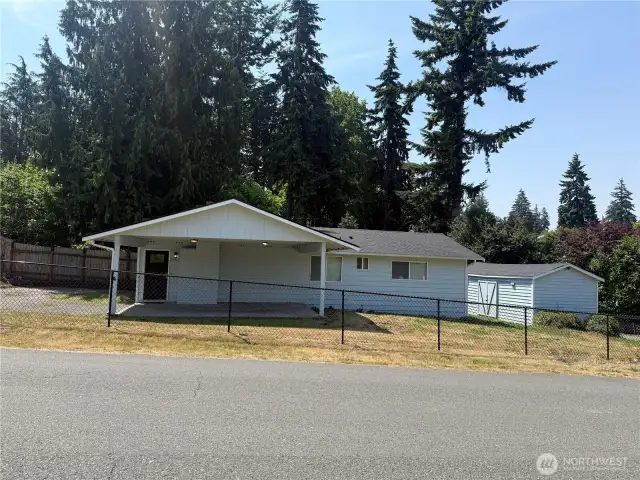 Fully fenced and gated driveway
