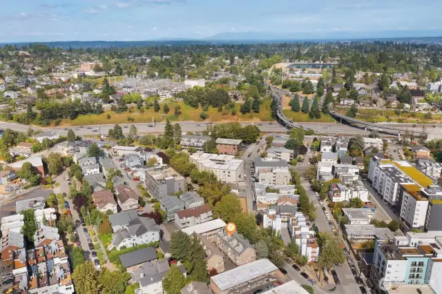 Aerial photo looking east. Green Lake is just 1 1/2 blocks away! 91 walk score! 92 bike score! Walk to everywhere from here including light rail! Only minutes to downtown, UW, Amazon, and 520.