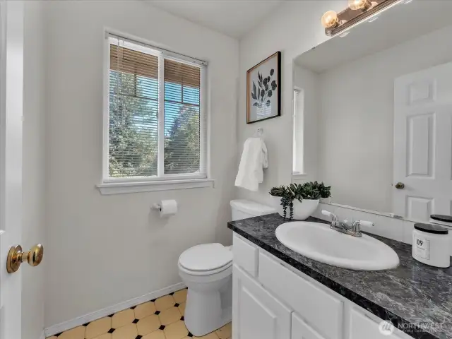 Primary bathroom with double fanity.