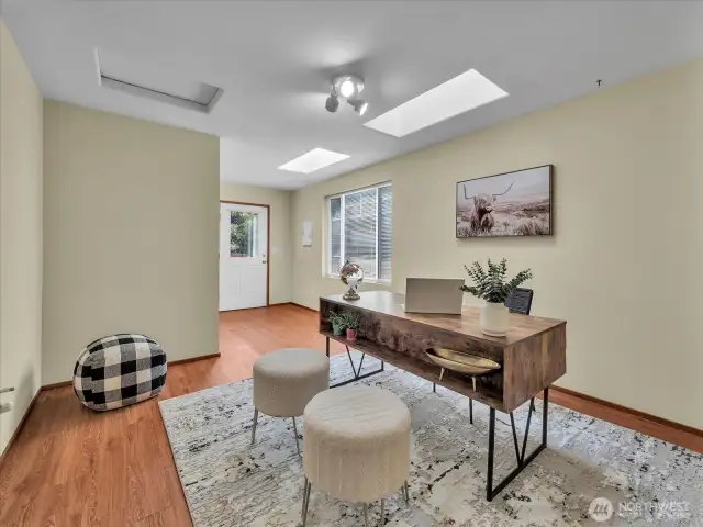 Extra room off primary bedroom that leads to deck and back yard.