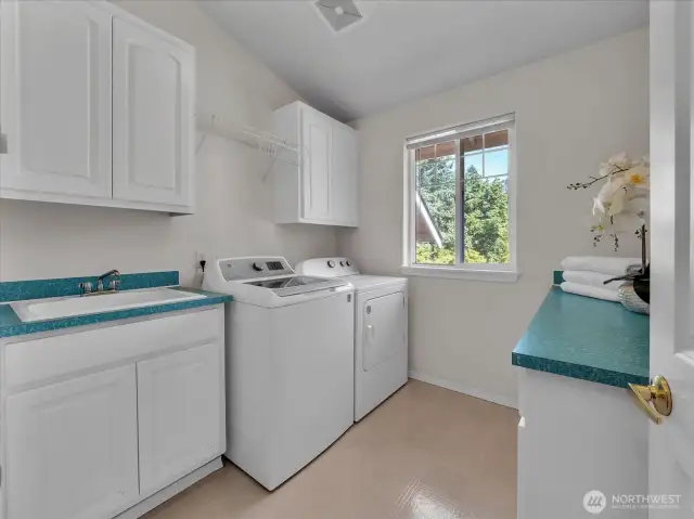 Extra large laundry room on main level.