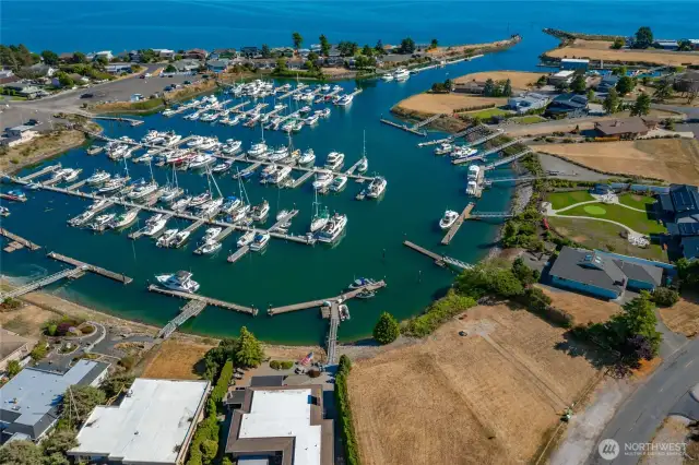 What you see moorage wise are the Village homeowners rented morage spots in the middle. The homes with private docks are on the border. This property has the left side of this dock and is 50+/- in size.