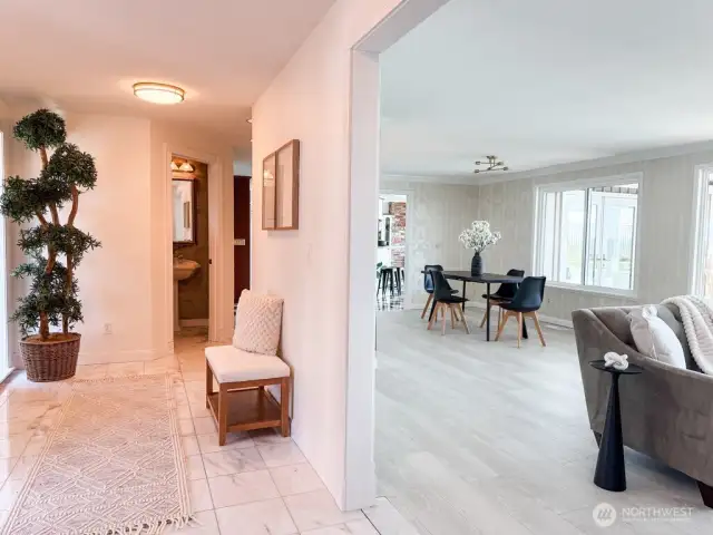 The spacious entryway makes a stunning first impression and provides a seamless flow to the main living areas