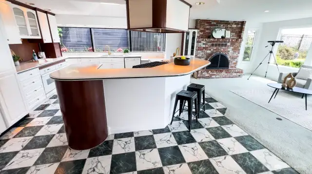 Enjoy cooking in your chef’s kitchen outfitted with high-end appliances, oversized island, and custom cabinetry